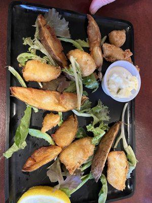 Walleye strips! More breading no fish and a left over baked potatoe made into steak fries!! The hamburger, was Slider size