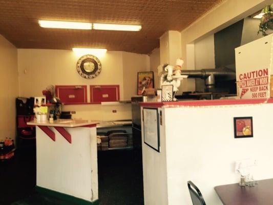 The counter area; the pizza oven and one hard-working man behind that wall on the right.
