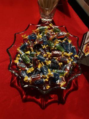 After dinner mints, jolly ranchers. Not recommended for a high dollar upper class fancy restaurant, especially for elderly.