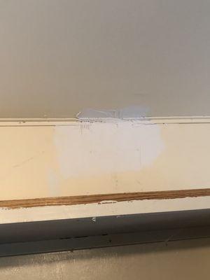 Here's a hole he patched and didn't paint over