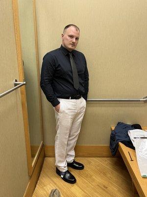 Trying on new shoes, belt, pants, tie and shirt for an upcoming daddy/daughter dance