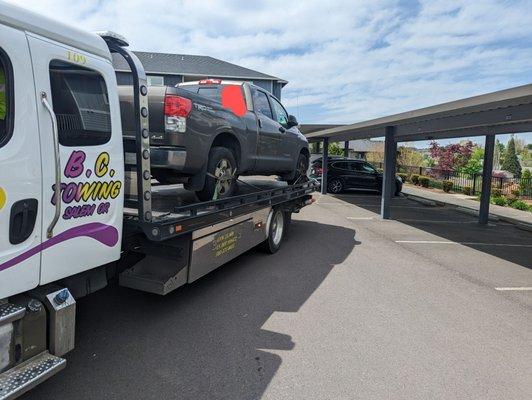Truck was in the empty space near the top of the photo, against the pillars. Driver got it out without damage and fast.