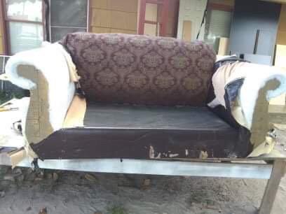 Demolition on damaged sofa