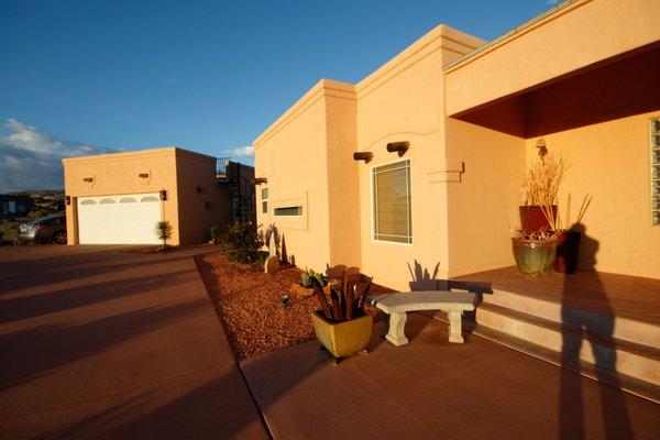 Front of the B&B...left building is the garage with guest fridge and microwave; hot tub is on the roof. Main building on the right.