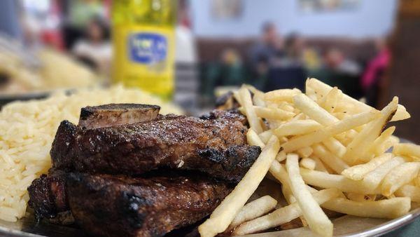 Half order beef ribs, fries,and rice