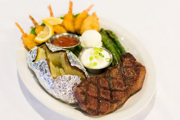 New York Strip Steak with a side of breaded shrimp