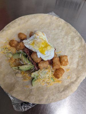 Crispy fried egg, savory spam, grilled onions, and creamy avocado, finished with our signature drizzle for a rich, salty-sweet knockout.