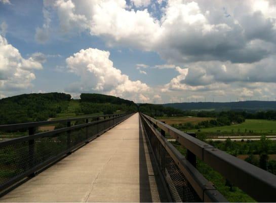 1,900 feet long and 100 feet high..... Awesome to cycle across!