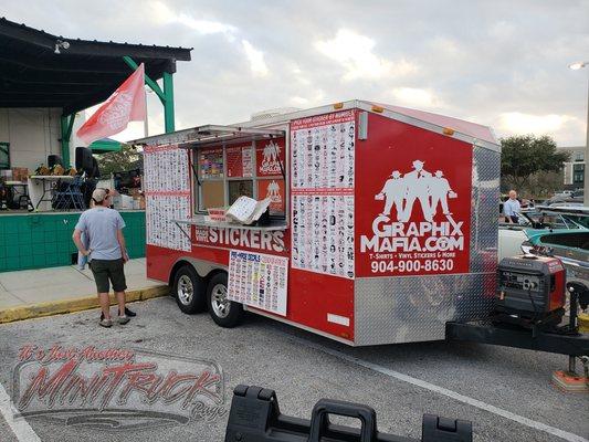 Mobile sticker trailer and sign shop on wheels.