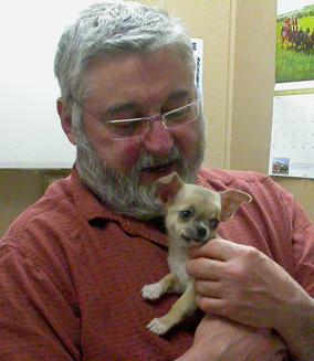 Our wonderful doctor, introducing himself to a new puppy for the first time.