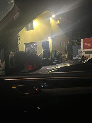 And this is the building to the right of the food truck. You walk up to the window, and Papi will greet you.