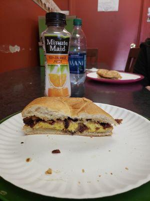 Bacon, egg and cheese on a roll.