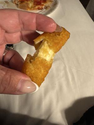 Mozzarella stick- I had to hold it apart to show the cheese. Best way to describe it is a breaded string cheese stick.