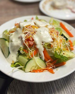 Complementary salad with the meal pasta