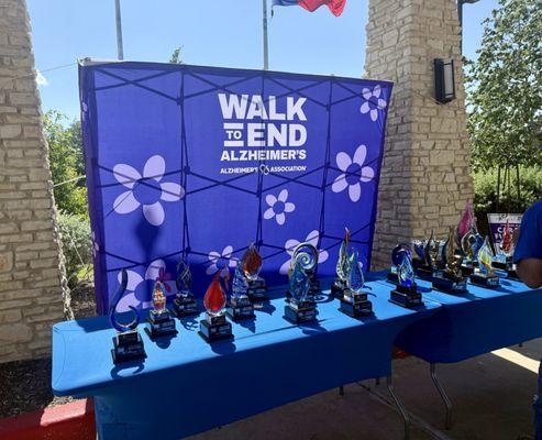 Walk to End Alzheimer's Car Show at Discovery Village. Table of awards