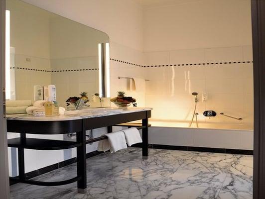 Every job is custom fabricated to your specifications. (Statuary marble and Porcelain tile)