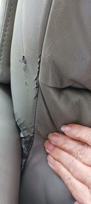 Vinyl peeling, cracking away next to leather back