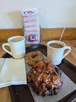 Apple fritter, maple old-fashioned, two coffees, and lotto tickets!