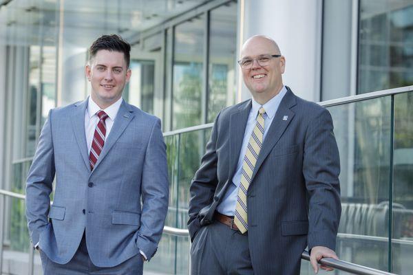 Brian and his oldest son Zach outside their downtown Nashville West End office.
