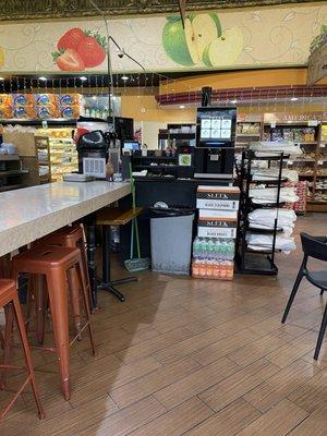 Counter seating and self service coffee station.