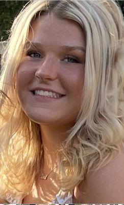 my daughter with highlights, low lights, nice beach curls for a dance