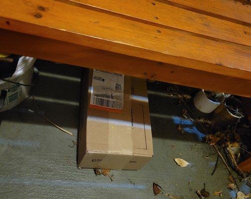 Package hidden under bench....good job