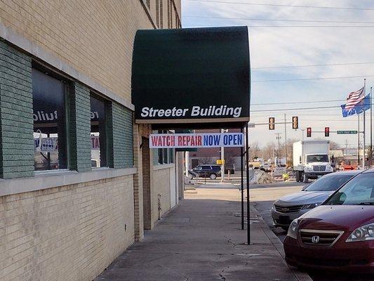 Inside the Streeter Bldg. on the Second Floor. There is an elevator. TnT