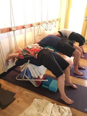 Lots of props that allow for back bends that wouldn't otherwise be possible.