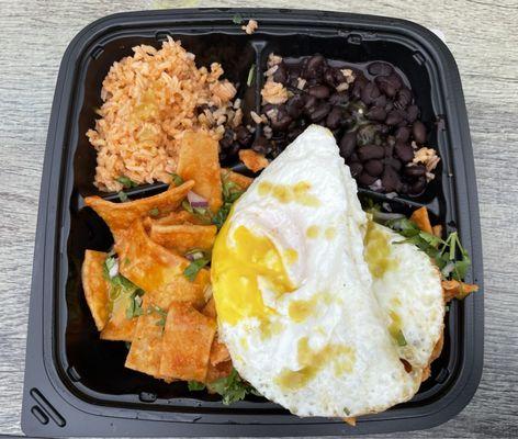 Chilaquiles with over easy egg and black beans