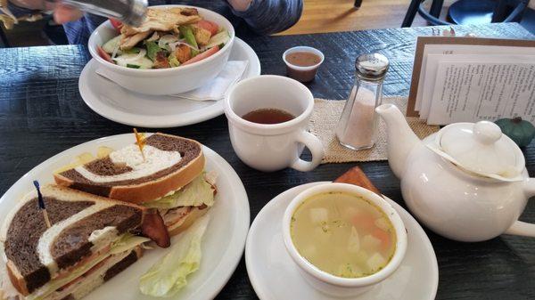 Field of Greens salad with grilled chicken, turkey sandwich on marbled rye and cup of chicken and rice soup.