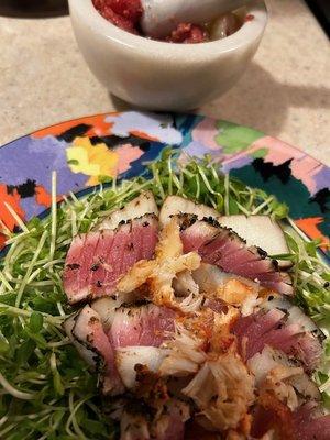 Sliced smoked scallops from Për's - layered with seared ahi and topped with smoked lobster from Për's!