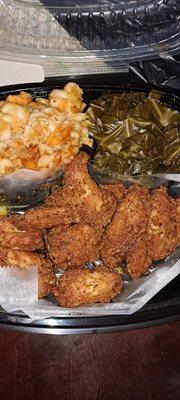 Lemon pepper chicken wings, collared greens, and Mac and cheese