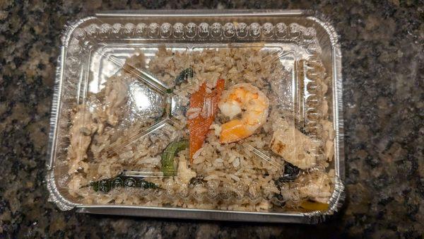 Basil fried rice doesn't even fill the container... one additional piece of overcooked shrimp for $1