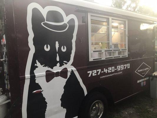 Meow meow says the gentleman cat at Ramen and waffles food truck