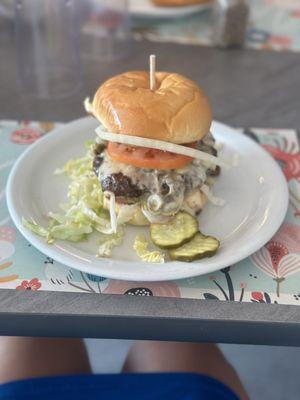Green olive and Swiss burger
