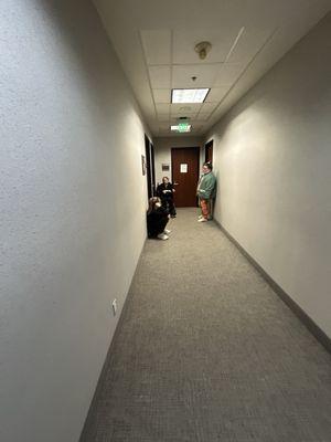 Sick patients having to wait in the hallway