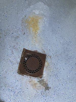 old drain grain rusted on and saturated with water-ruined my brand new still curing epoxy near the drain area