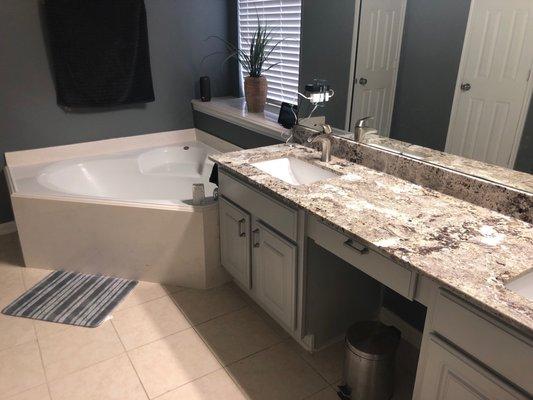 All around the tub and window area was suppose to match the counter top. Counters is all they did, now my entire kitchen is mix and match