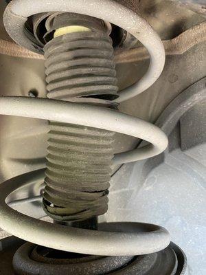 Invoice with date of purchase for front struts and date.