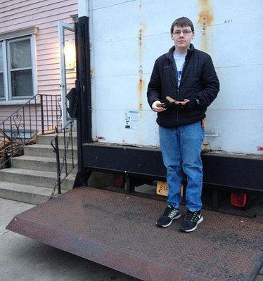 Our Vice President on the Delivery Truck (Picture Taken Nov. 2014)