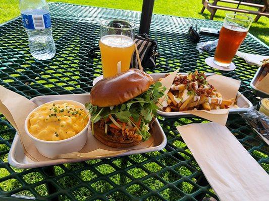 Banh-Mi chicken sandwich with Smoked Gouda Mac and half order of Loaded Fries.
