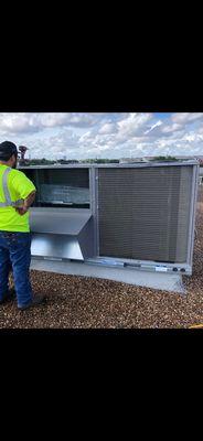 One of our head technicians Josh after diagnosing the issue and waiting for the frozen evaporator coil to thaw to begin servicing.
