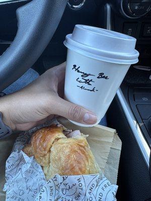 I had a Ham and cheese croissant, breakfast sandwich and it's delicious honey bee latte with almond milk.
