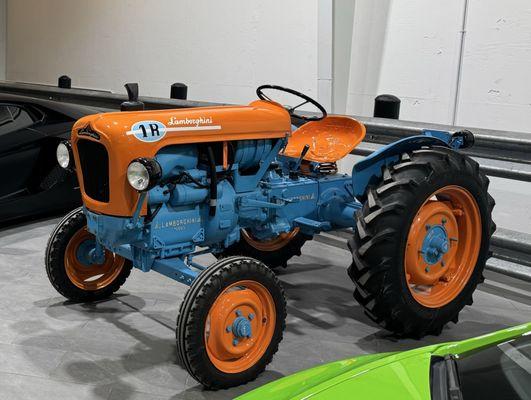 Lamborghini tractor (stationed between two Lamborghinis)
