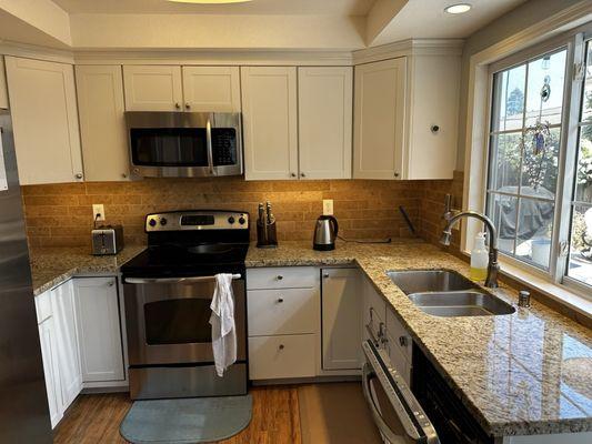 New ceiling lights over the sink and undercabinet lights. Excellent recommendations. Turned out fantastic!