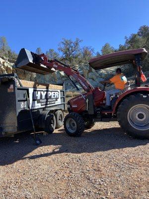 Our tractor, trailer, and Operator working on a roof tile removal in Sand Canyon California.