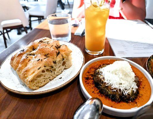 homemade focaccia baked daily - served with salsa macha, chili oil & manchego cheese