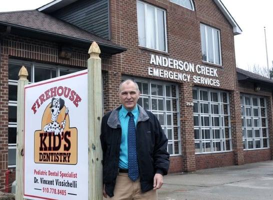Dr.Visichelli outside the ddental office from the fayetteville observer.