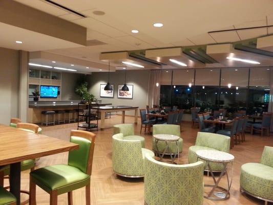 Beautiful modern look with individual TVs at some booths.