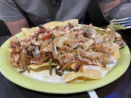 Dinner nachos with chicken.